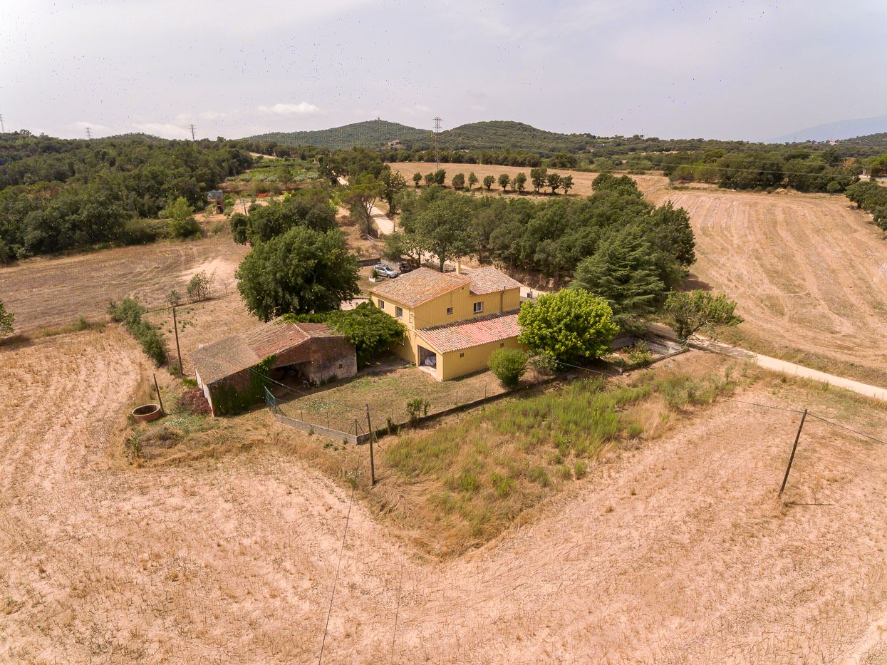 Country house for sale with haystack near the town